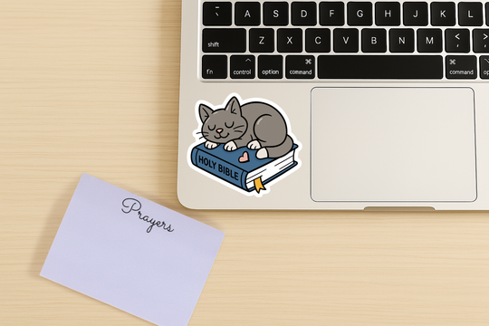 Grey Cat on Bible Waterproof Vinyl Sticker